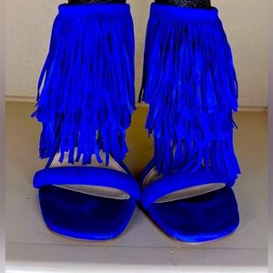 Rich and vibrant blue, fringe, stiletto heels! Turn heads and hearts! Size 9.5!
